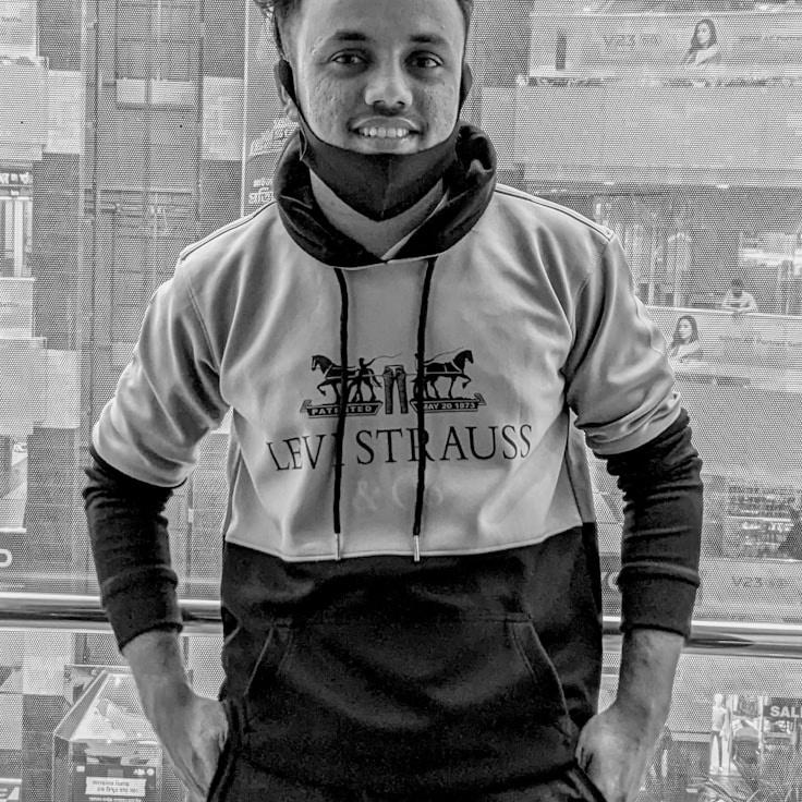 Jordan Chen, Client Relations Director, discussing corporate gifting strategy with business clients